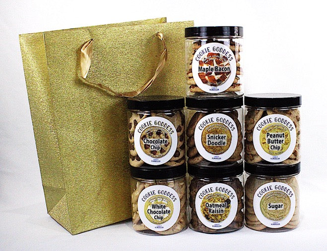 Collection of variety Cookie jars with maple bacon a gold gift bag 